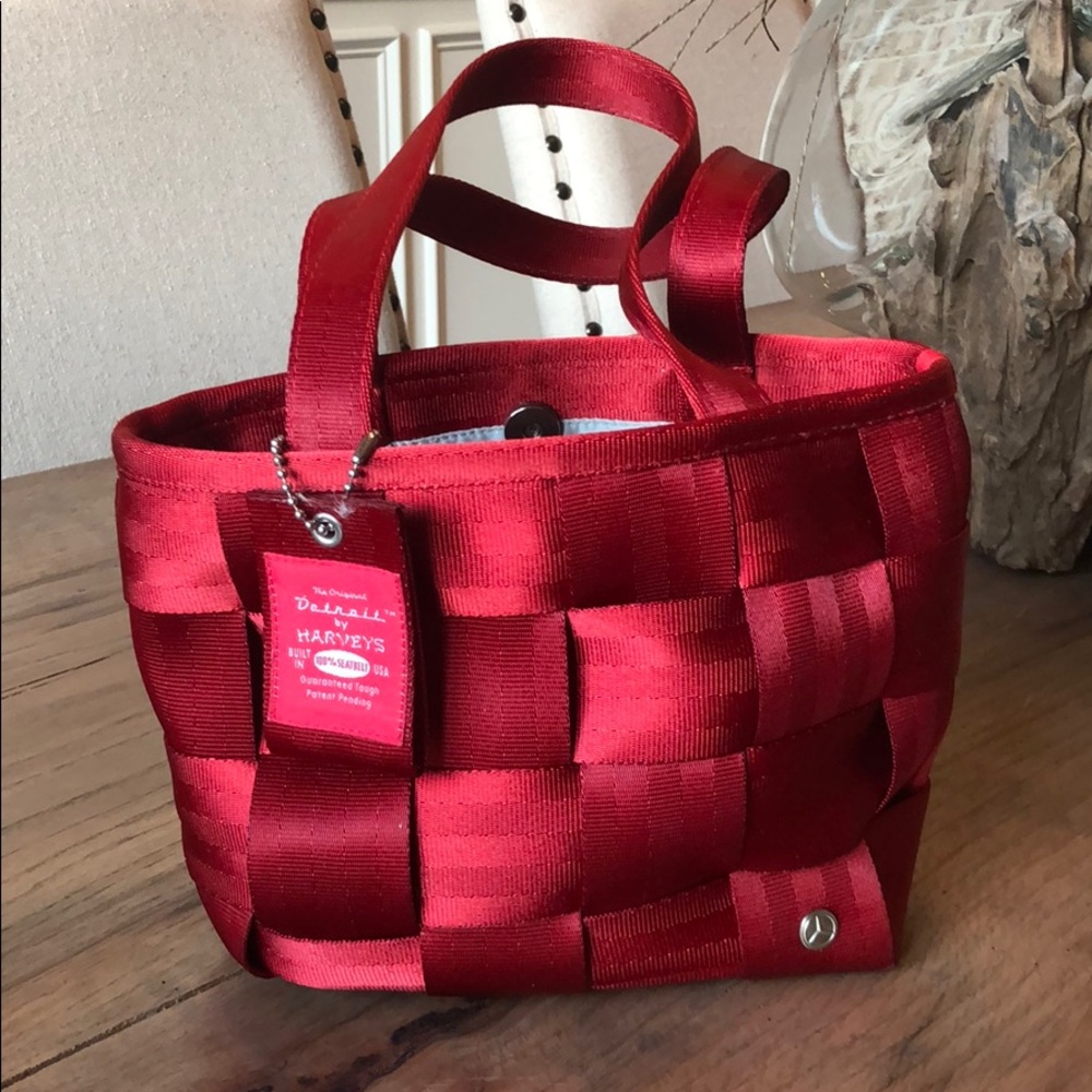 Red seatbelt purse